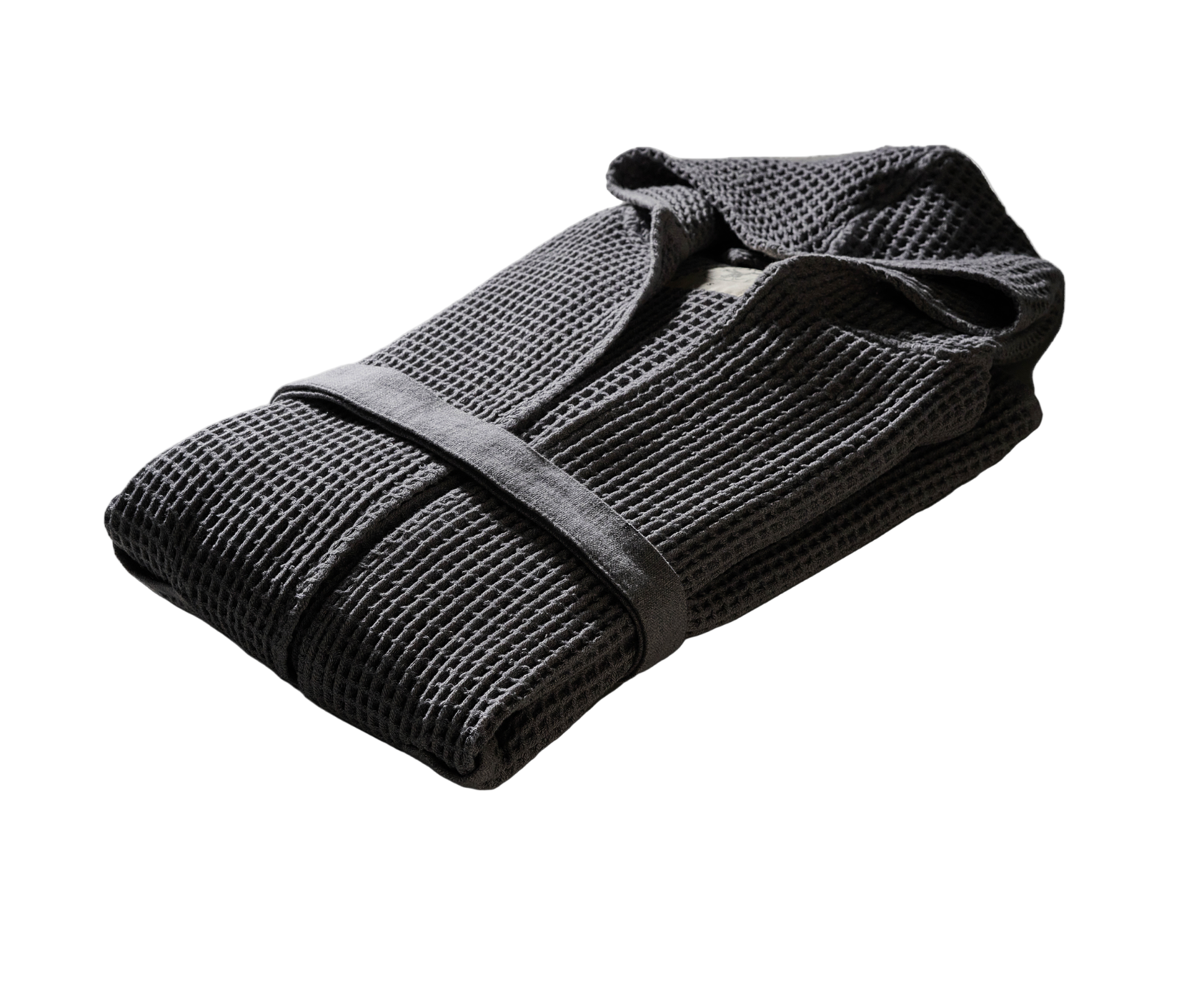 Folded dark gray textured garment on a white background