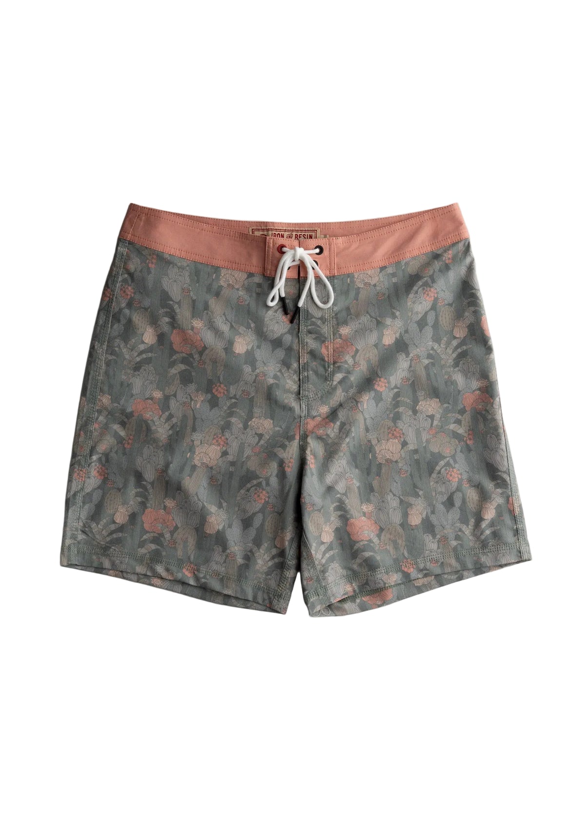 A pair of men's board shorts with a muted green and gray botanical print, a contrasting dusty rose waistband, and a white drawstring, shown flat on a light gray background.