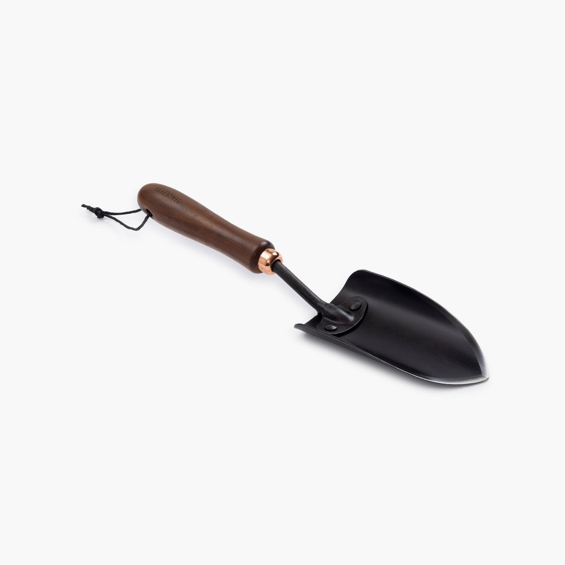 Black garden trowel with a brown handle on a white background