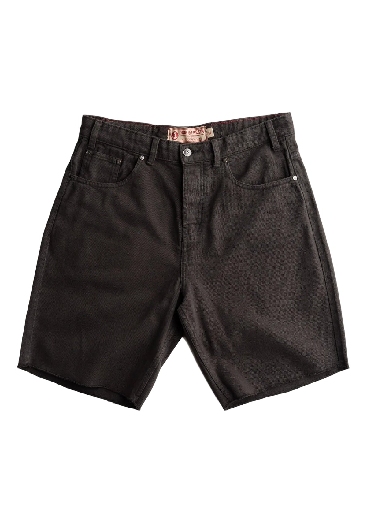 A pair of faded black denim shorts with a vintage, washed finish, laid flat on a light gray background. The shorts feature classic five-pocket styling, a button closure, and a visible vintage-style paper brand label at the waistband.