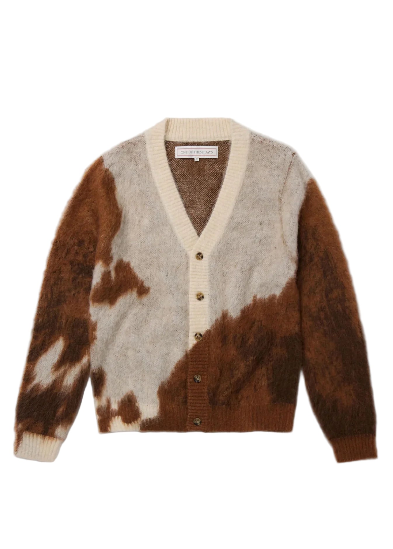 Brown and beige cardigan with a cow print pattern on a white background