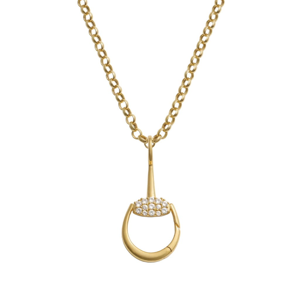 Gold necklace with a horse shoe-shaped pendant on a white background