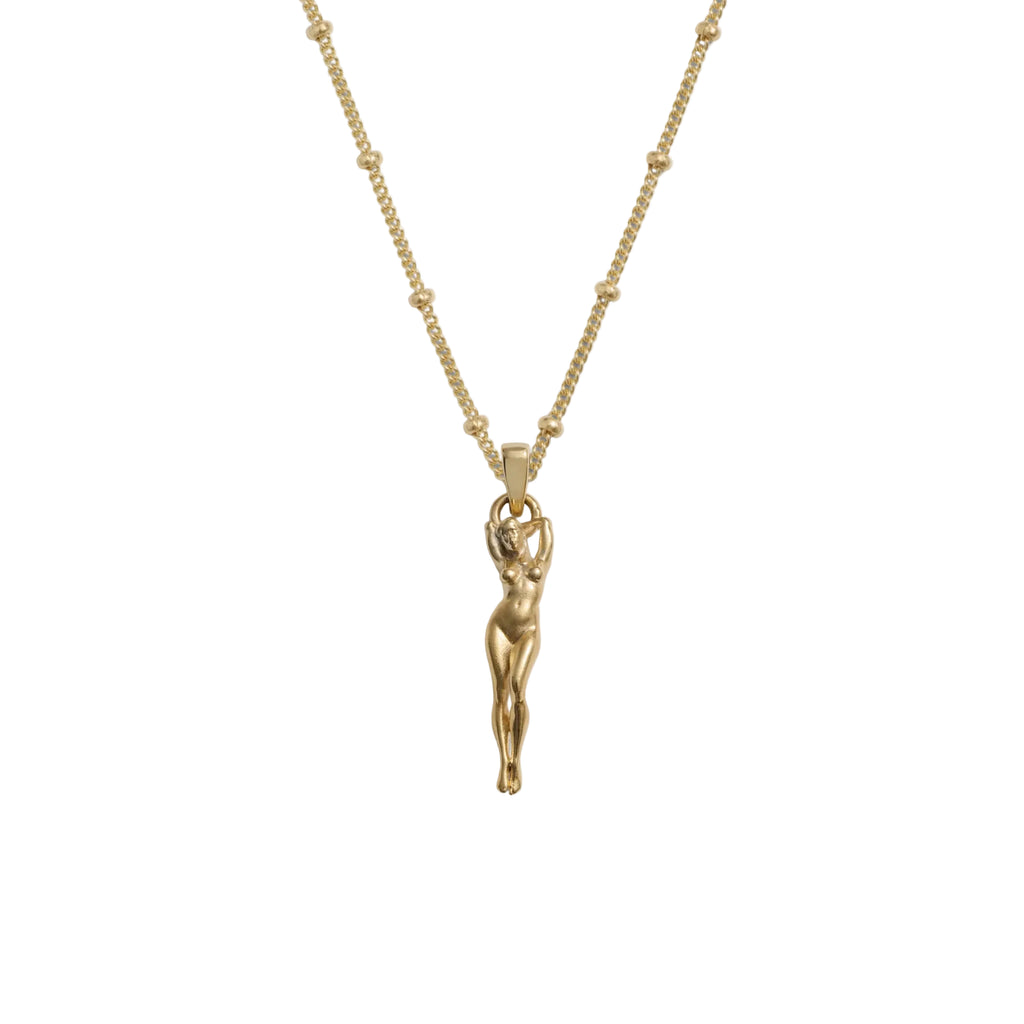 Gold necklace with a pendant on a white background