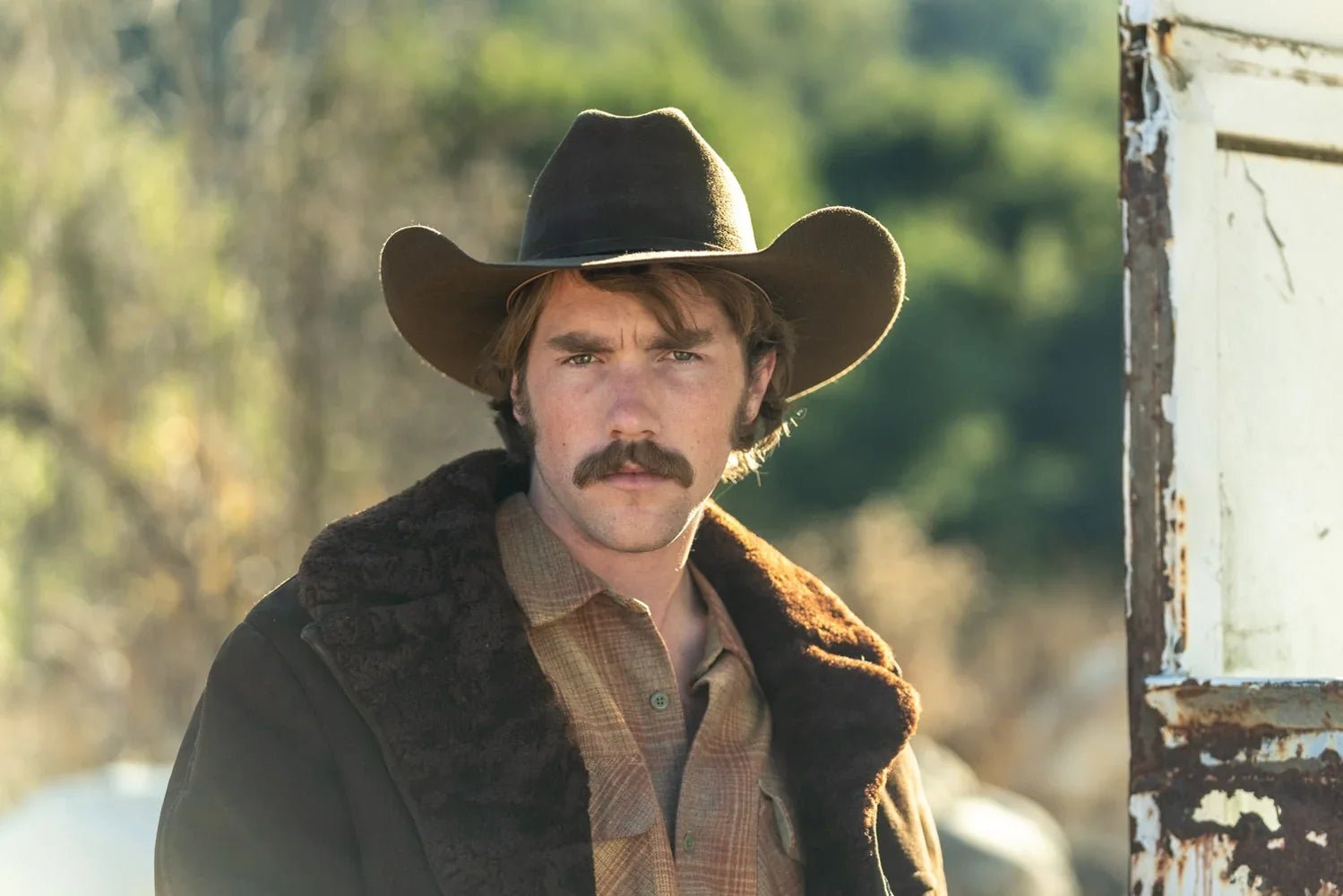 A Cowboy wearing the Black American Cowboy Hat at Paranoid Ranch