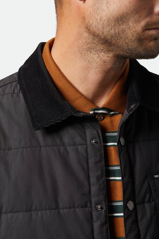 Detail of Brixton Cass Jacket collar on male model.