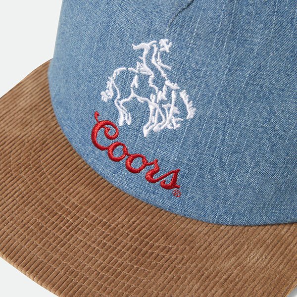 Close-up of Coors Banquet embroidery on front of Brixton all-cotton baseball cap.