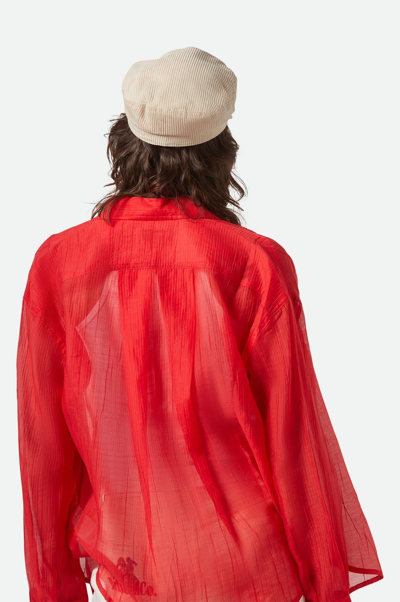 Back view of Brixton Fiddler Fisherman Cap in white corduroy with structured cut-and-sew design.