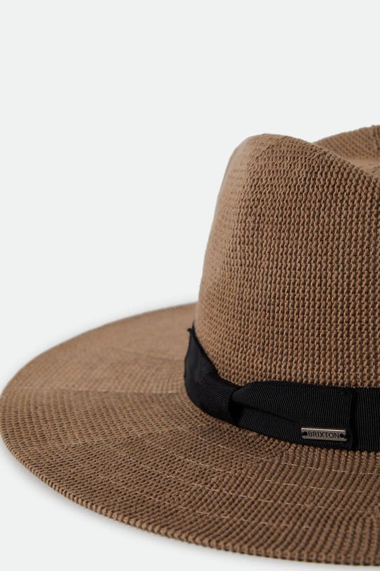 Detail of grosgrain band and metal headwear plaque on Brixton Lyons Packable Hat.
