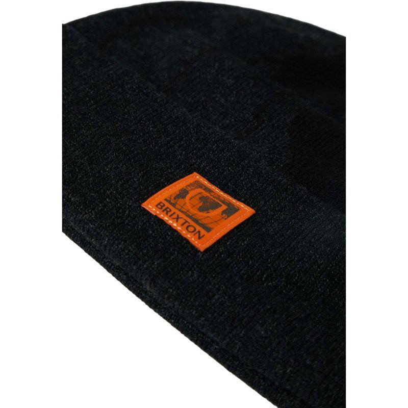 Close-up of jacquard crown and woven label on Union Watch Cap Beanie, soft durable acrylic knit.