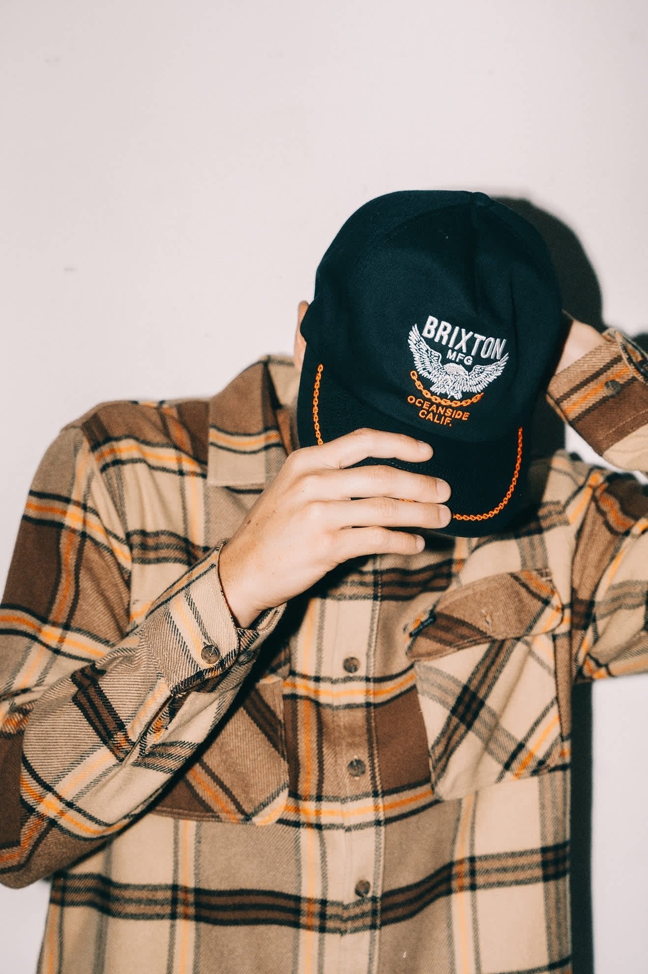 Brixton Waller Snapback hat with flat bill, vintage-inspired 5-panel design, cotton twill construction, and direct embroidery.