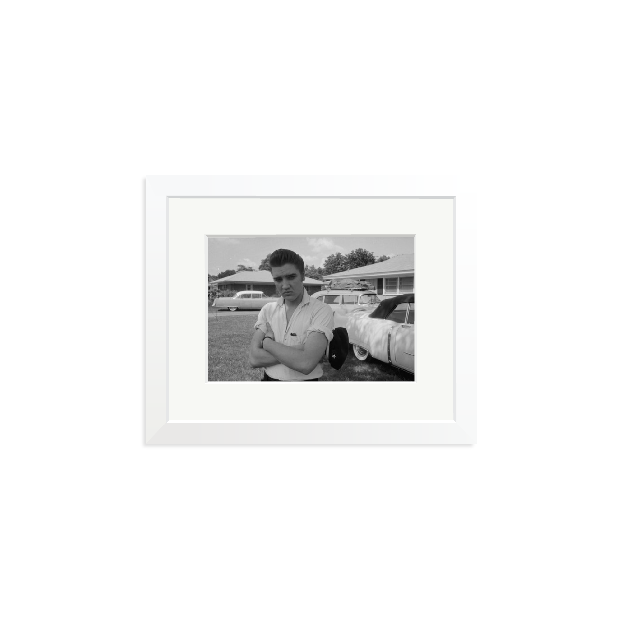 Elvis Presley with his Cadillacs