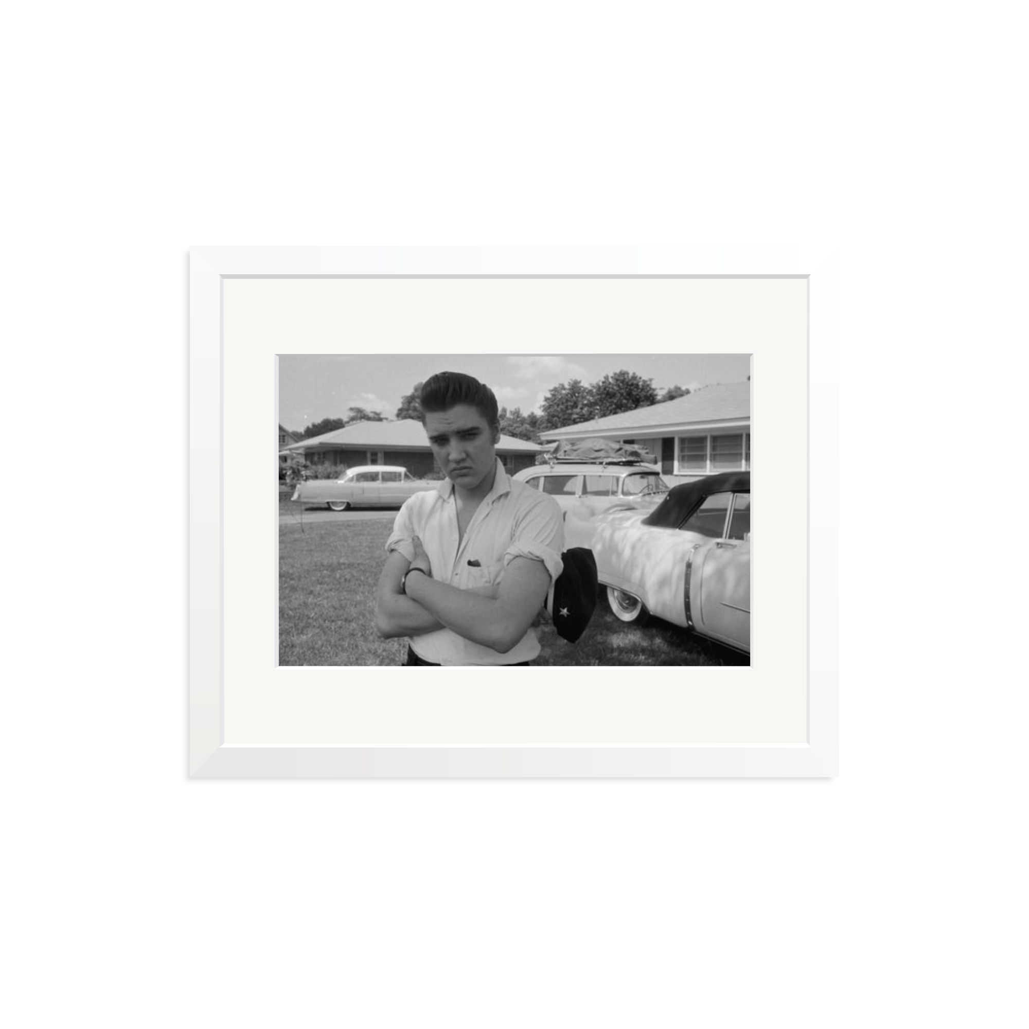 Elvis Presley with his Cadillacs