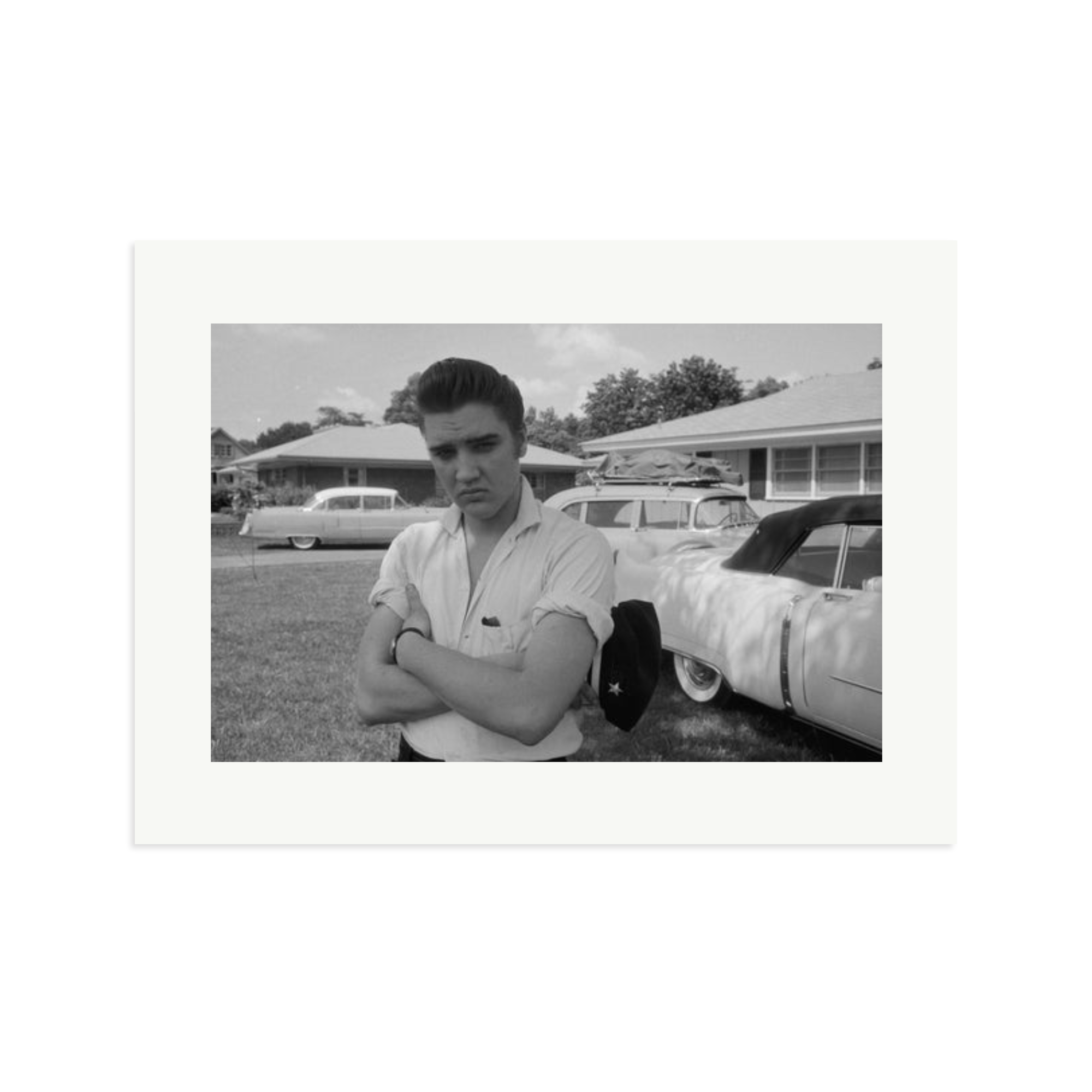 Elvis Presley with his Cadillacs