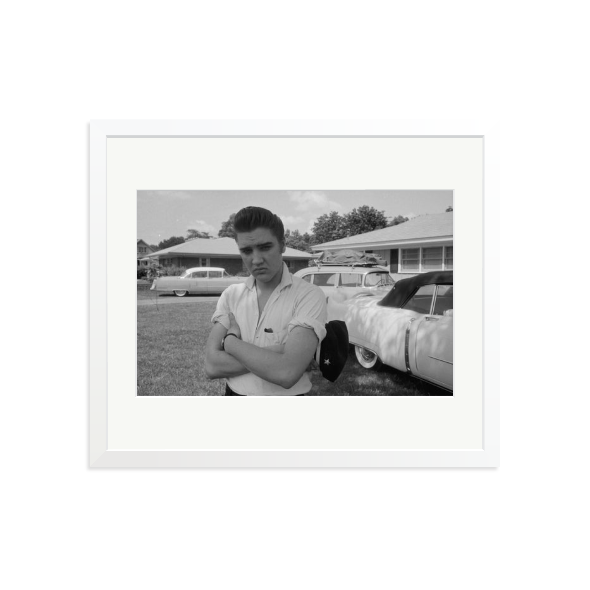 Elvis Presley with his Cadillacs