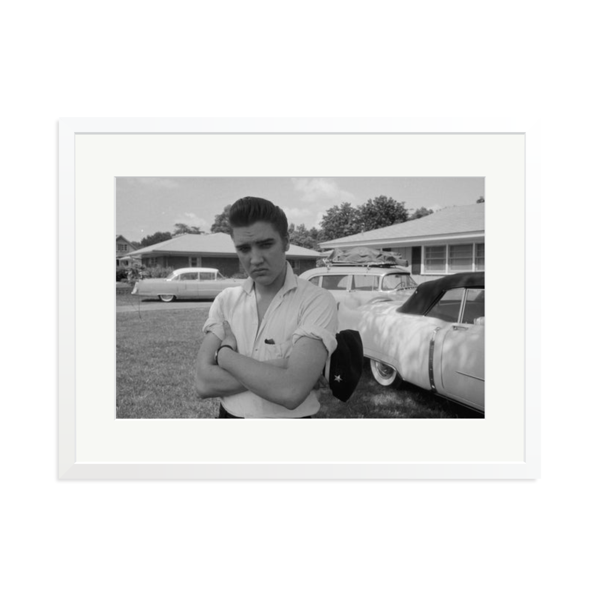 Elvis Presley with his Cadillacs