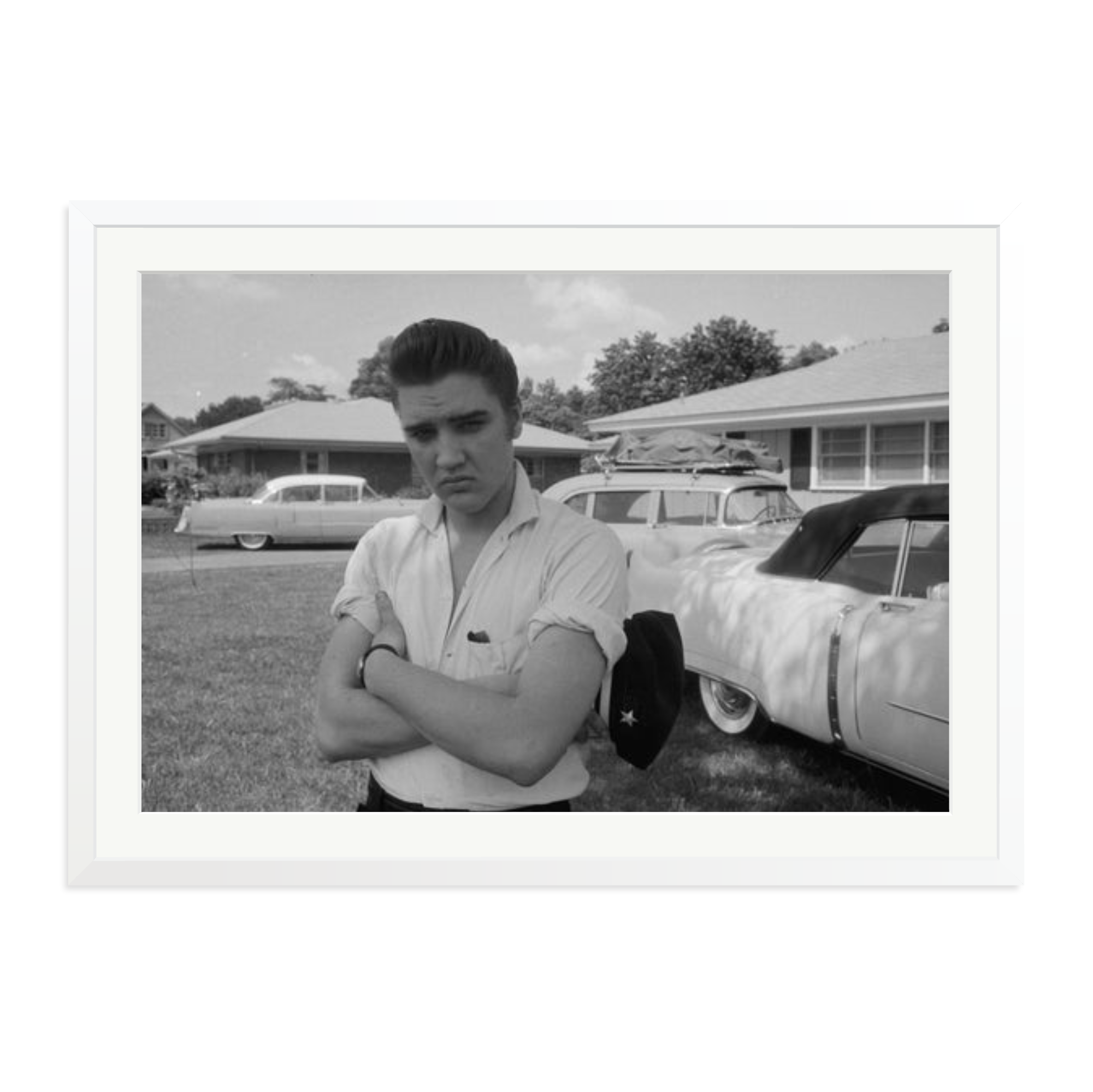 Elvis Presley with his Cadillacs