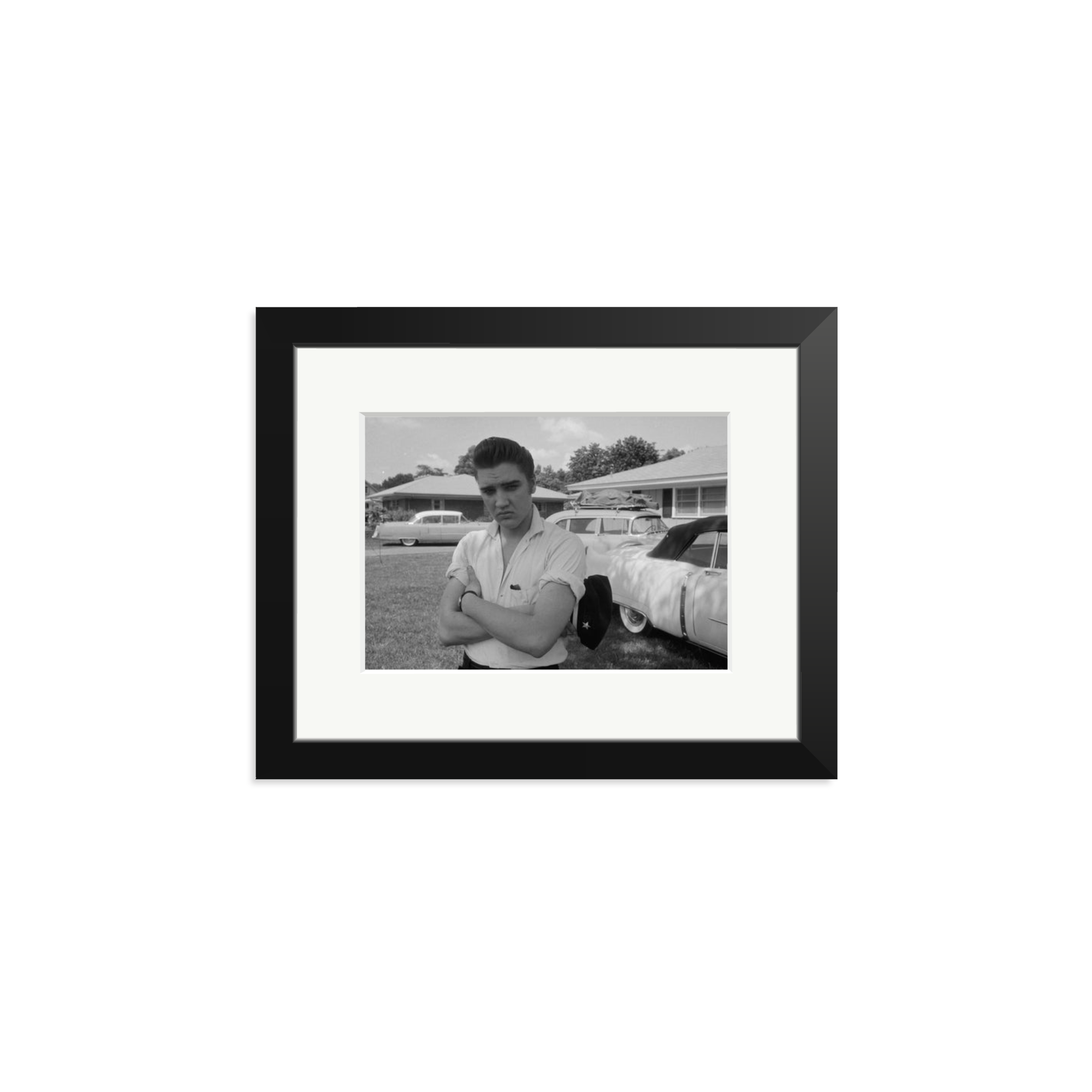 Elvis Presley with his Cadillacs