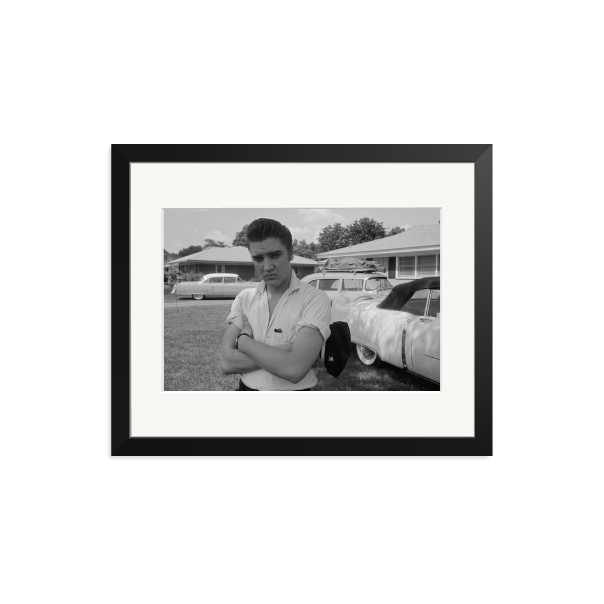 Elvis Presley with his Cadillacs