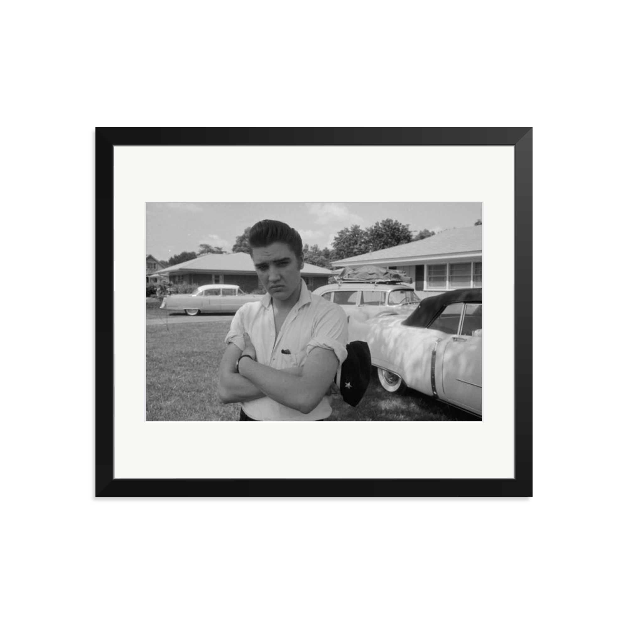 Elvis Presley with his Cadillacs