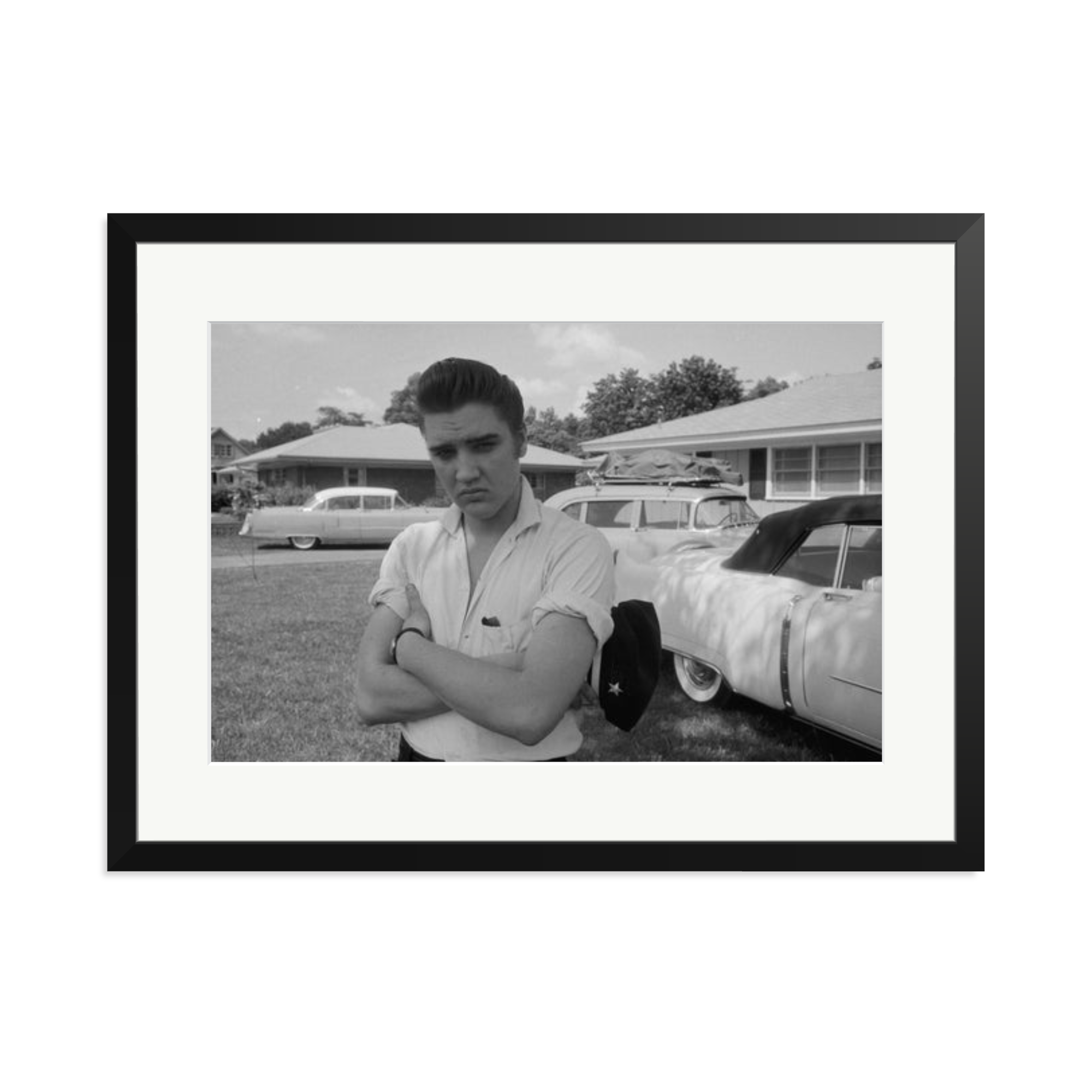 Elvis Presley with his Cadillacs