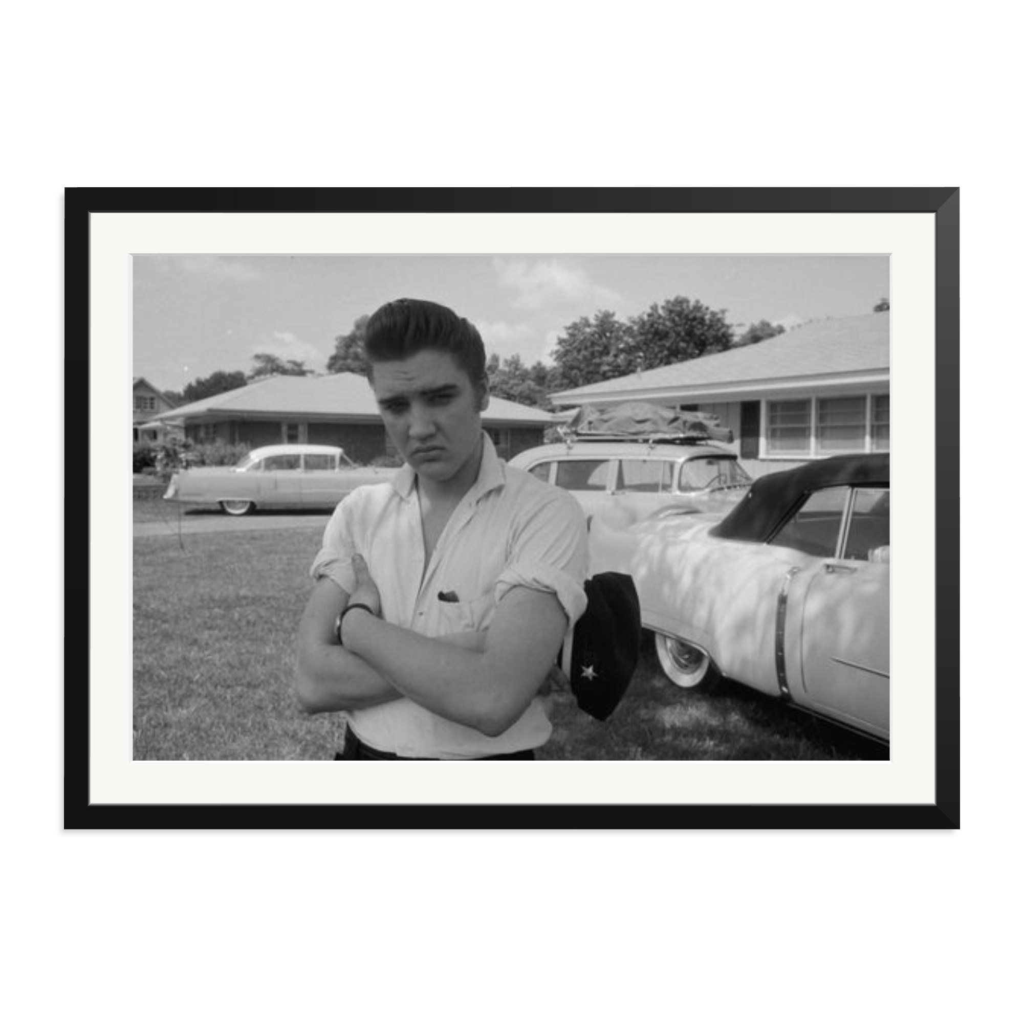 Elvis Presley with his Cadillacs