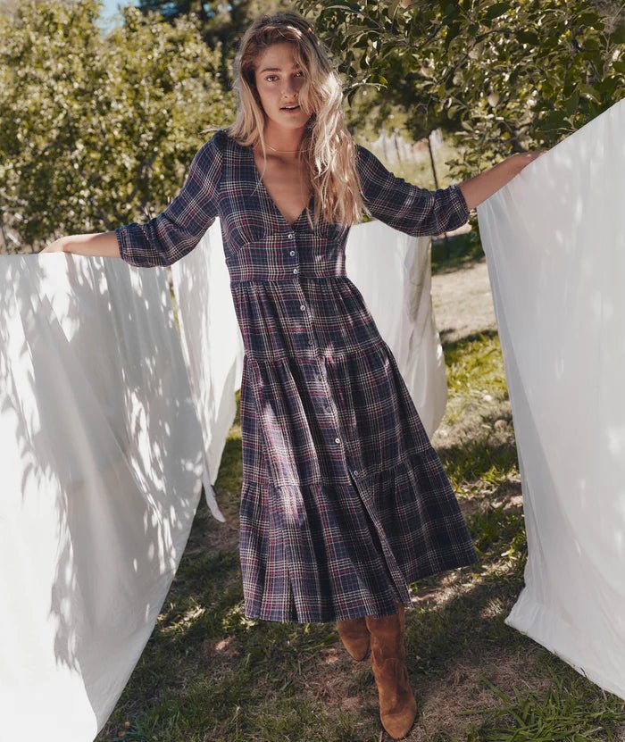 woman outside wearing the plaid marine layer Maeve Maxi Dress - Paranoid Ranch