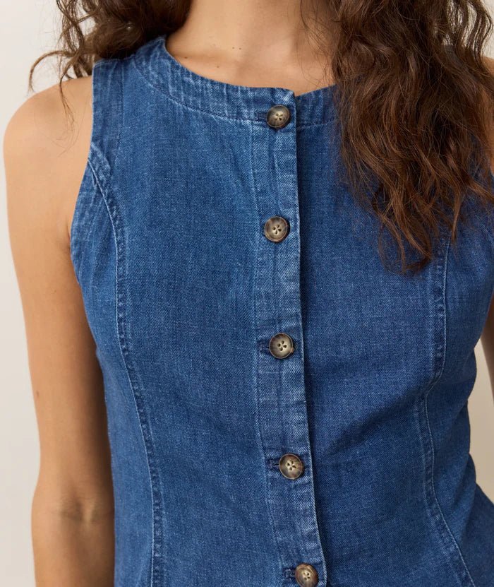 Close up view of the buttons on the marine layer Charlie Longline denim Vest - Paranoid Ranch