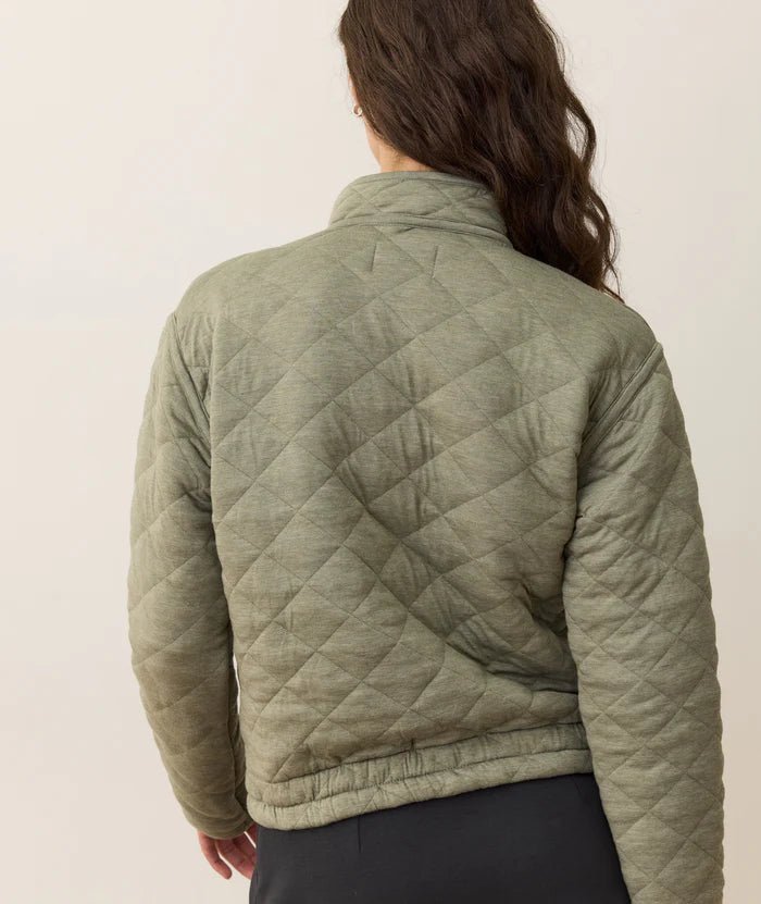 back view of model wearing the marine layer Corbet Quilted Jacket - Paranoid Ranch
