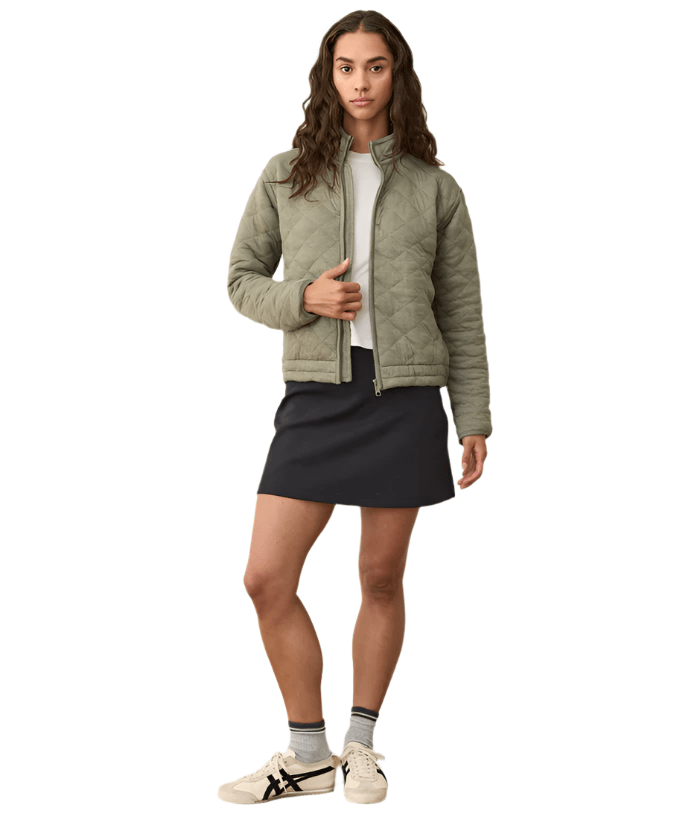 Woman wearing the Green Marine Layer Corbet Quilted Jacket - Paranoid Ranch