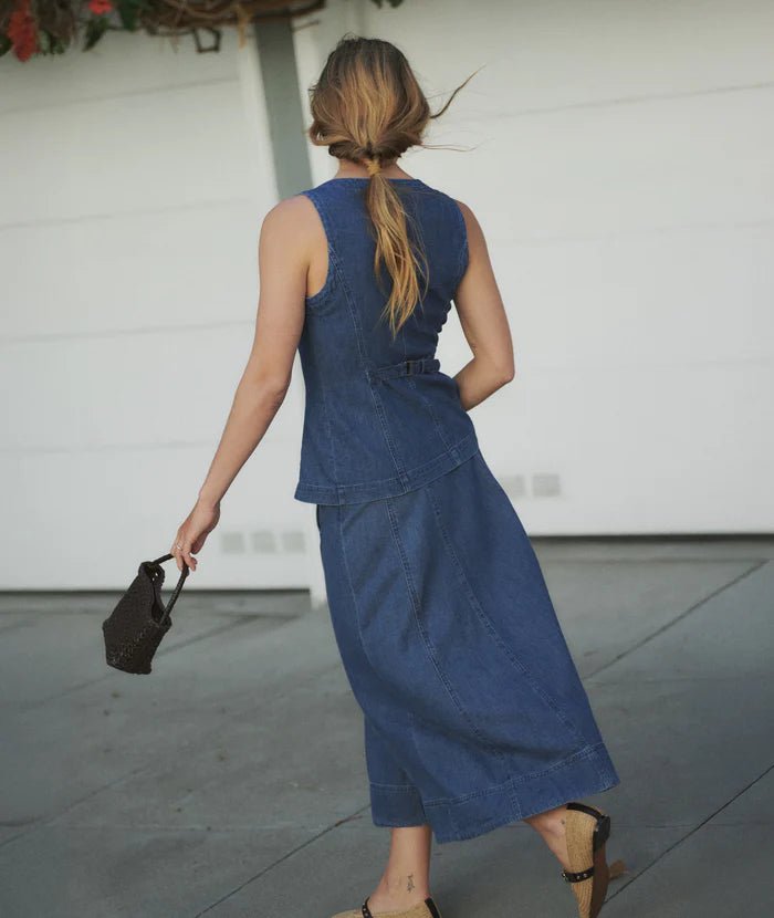 back view of a woman on the street wearing the Marine Layer Charlie Longline Vest - Paranoid Ranch