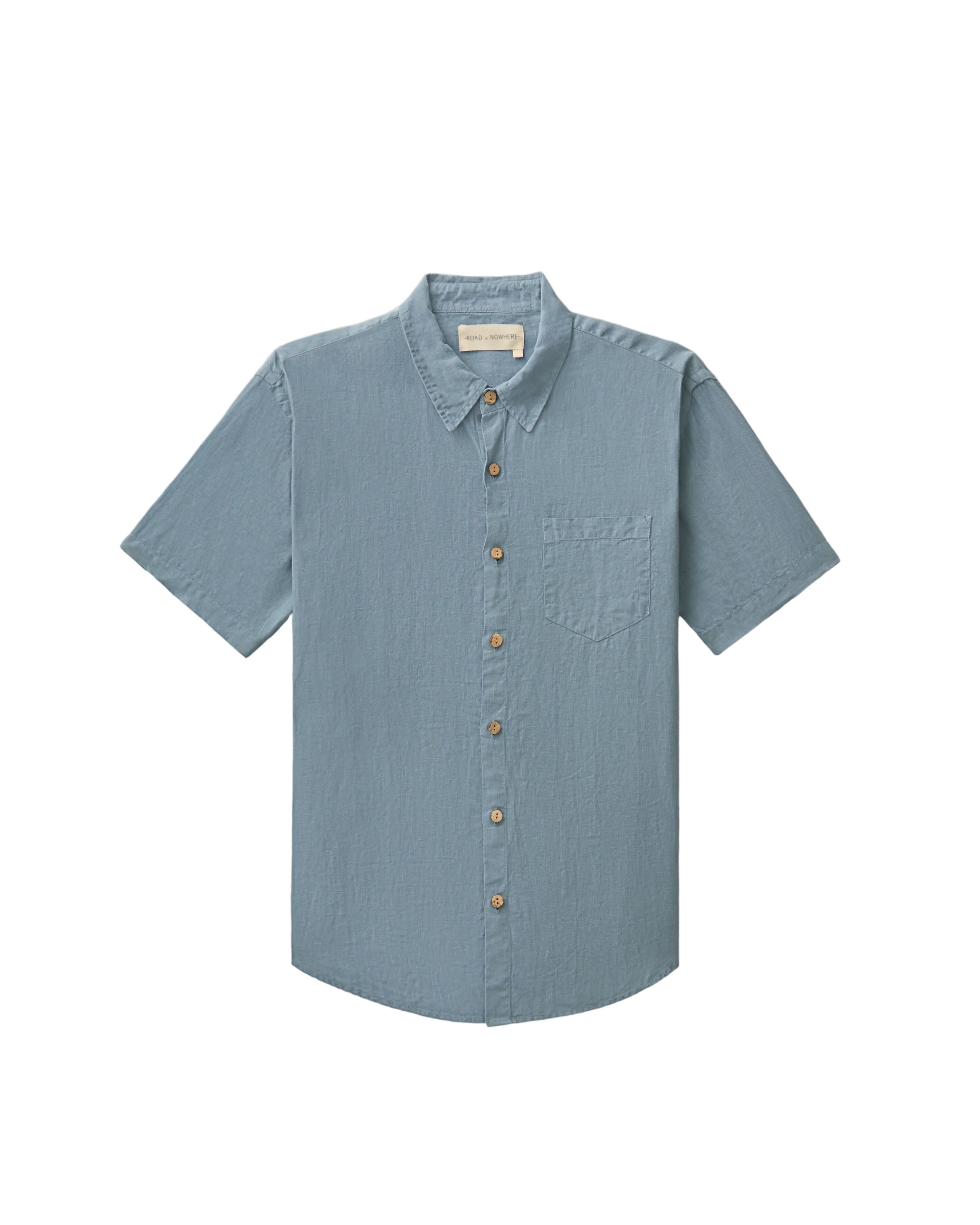 A light blue short-sleeve button-down shirt with a single chest pocket, laid flat against a white background.
