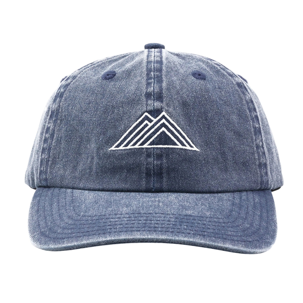 Blue denim cap with a white mountain logo on a white background