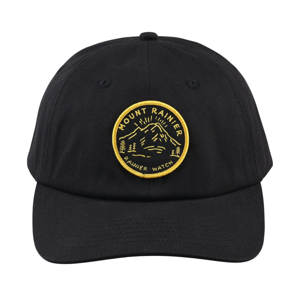 Black cap with yellow Mount Rainier embroidered logo on a white background