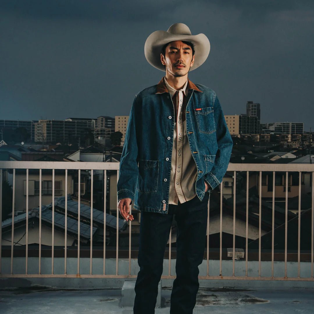 model wearing the Sendero Rustler washed denim coat, rugged layering piece with printed cotton liner and easy classic fit.