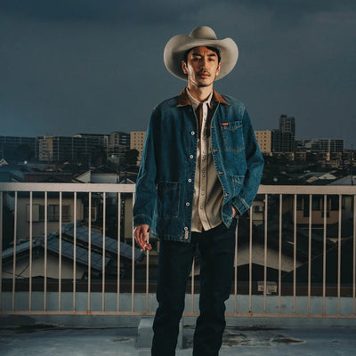 model wearing the Sendero Rustler washed denim coat, rugged layering piece with printed cotton liner and easy classic fit.