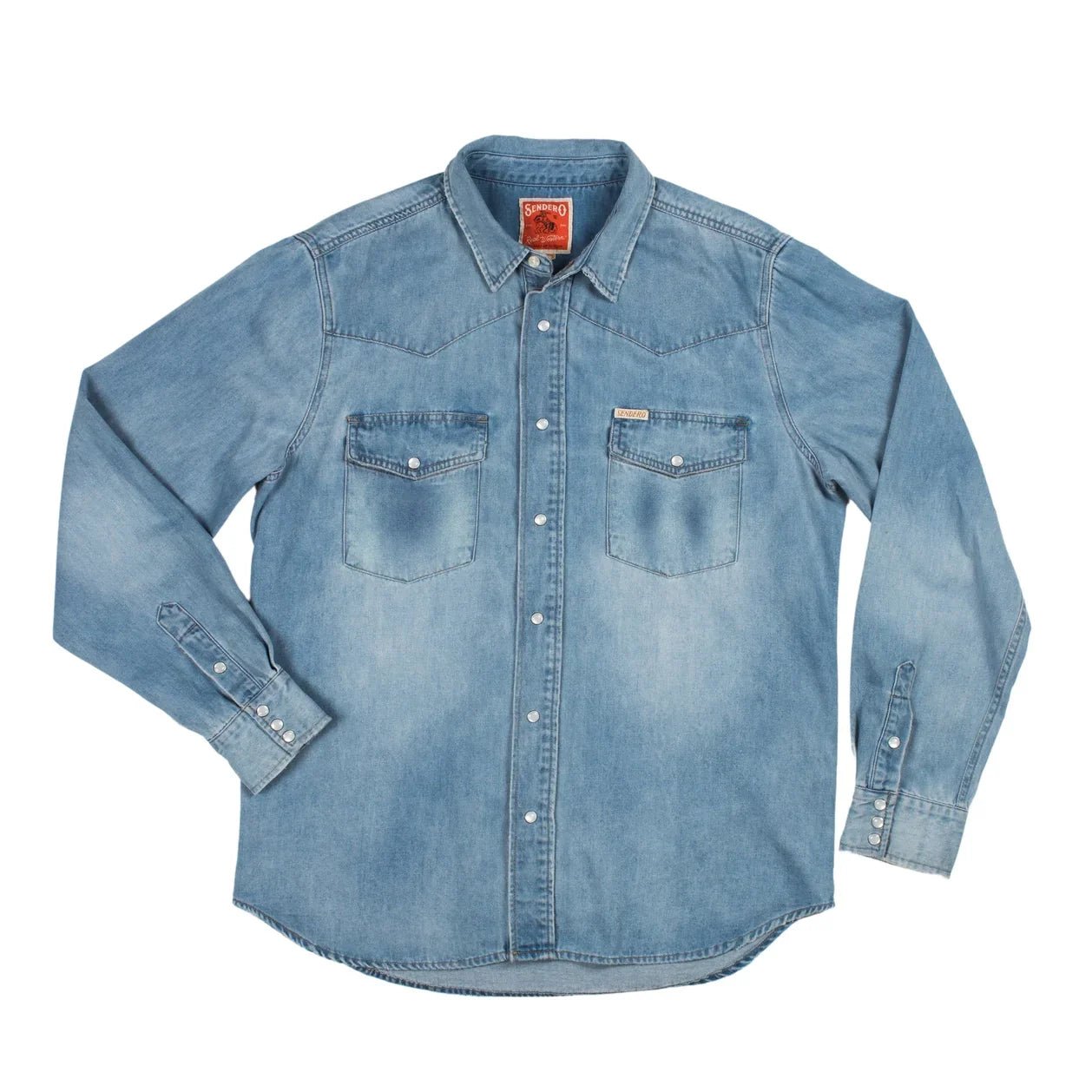 Sendero Wyatt Denim Shirt with vintage western pearl snaps and classic yoke detailing.