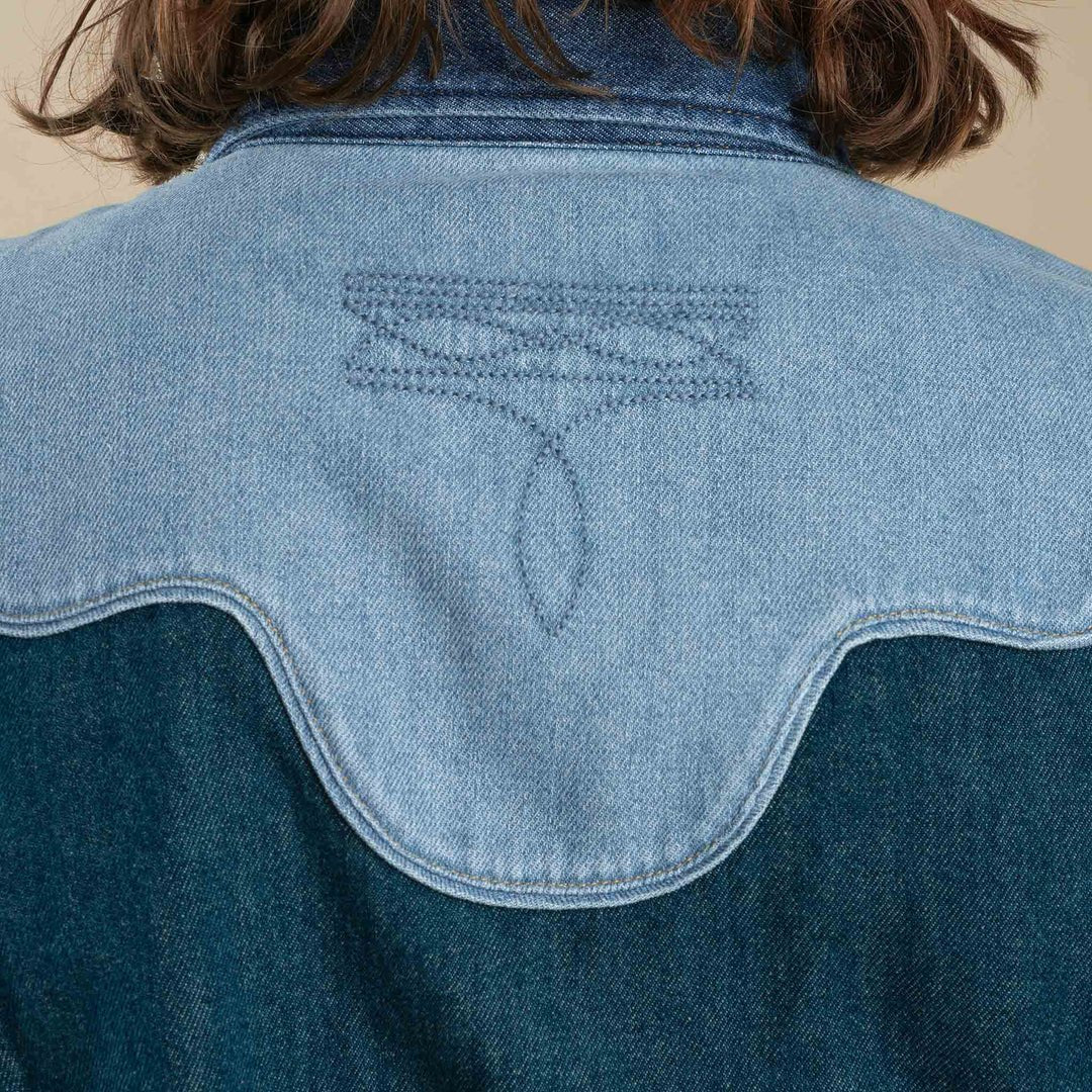 Close-up of signature boot stitch at back yoke on Sendero Pearl Snap Denim Shirt.